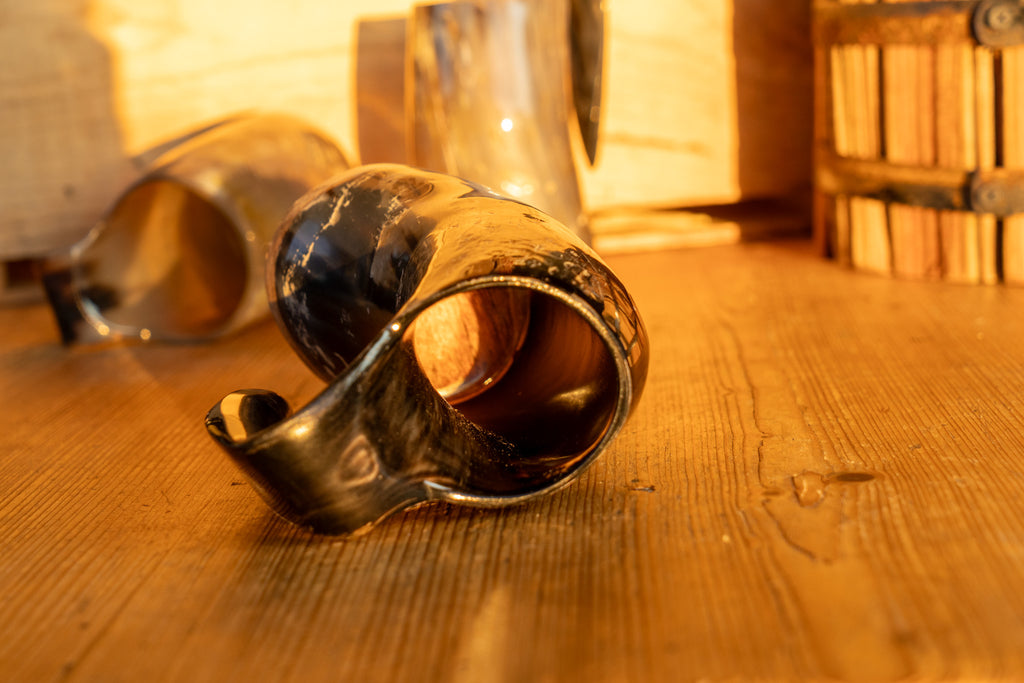 Horn Mug - A mug made from a real horn, with a wooden base.
