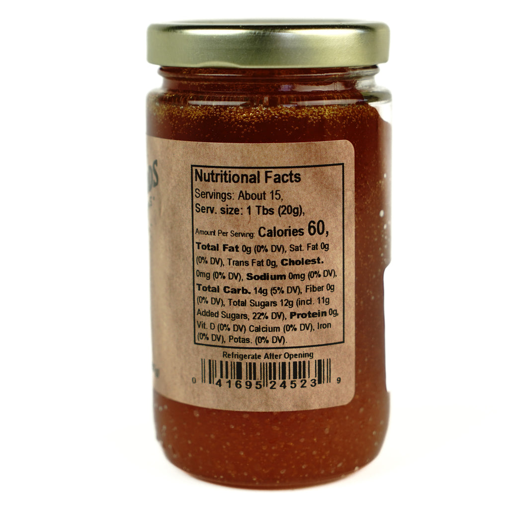 Apricot Jam - A jar of apricot jam, the back label showing ingredients.