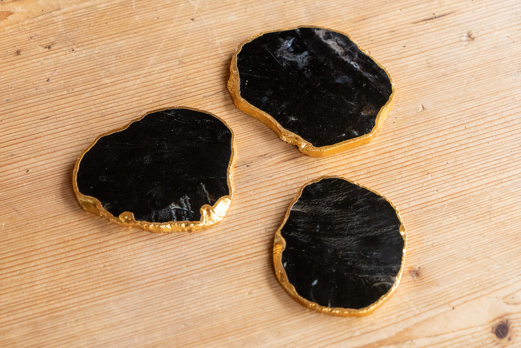 Sleek Black Agate Coasters Rimmed in Radiant Gold
