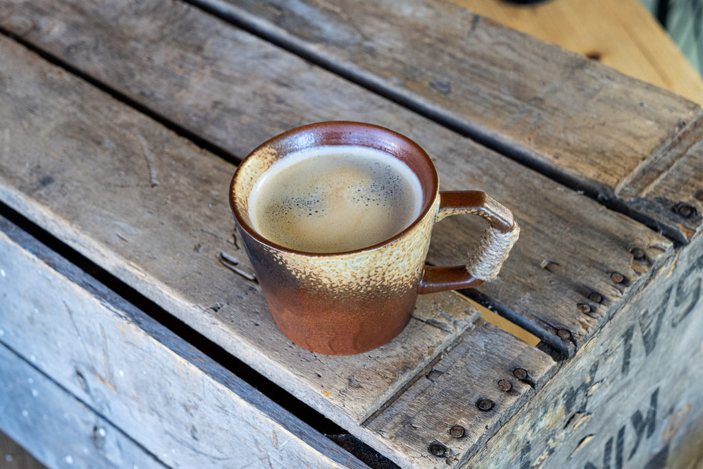 Rustic Handmade Ceramic Coffee Mug – Textured Stoneware with Earthy Glaze & Wrapped Handle