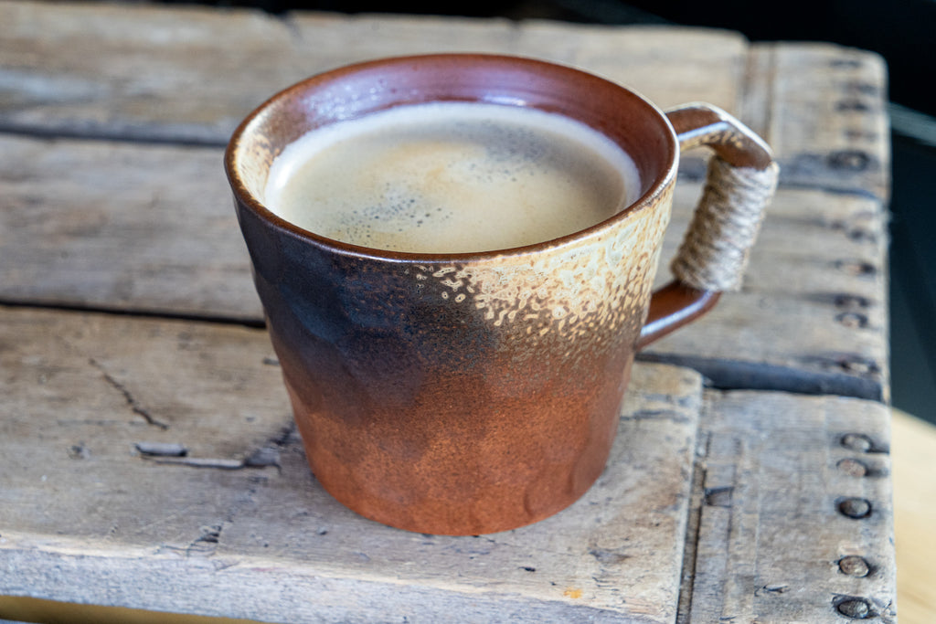 Rustic Handmade Ceramic Coffee Mug – Textured Stoneware with Earthy Glaze & Wrapped Handle