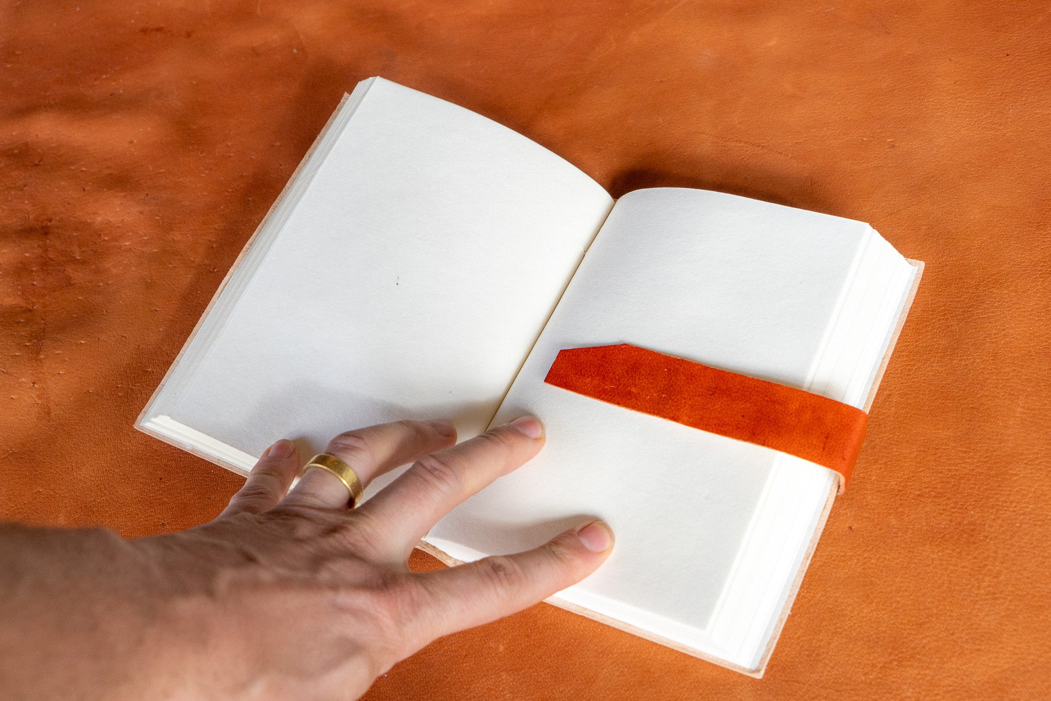 The Artisan's Leather Journal with a Stitch Strap Closure