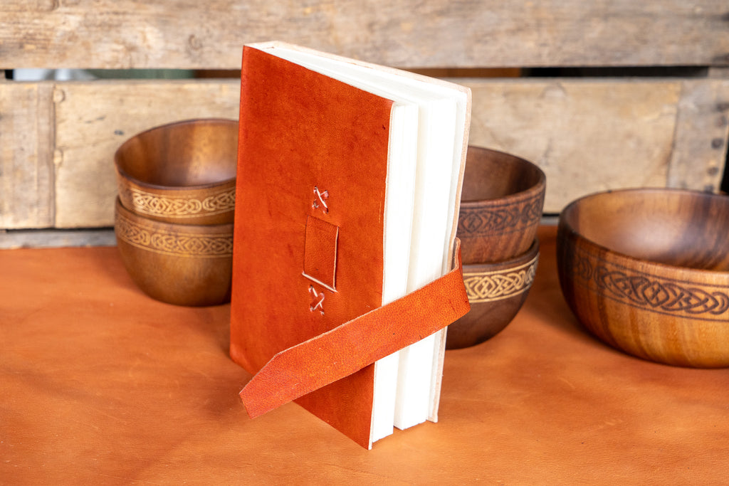 The Artisan's Leather Journal with a Stitch Strap Closure