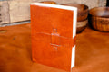 The Artisan's Leather Journal with a Stitch Strap Closure