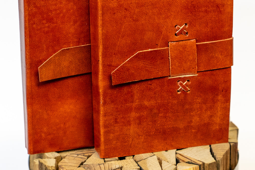 The Artisan's Leather Journal with a Stitch Strap Closure