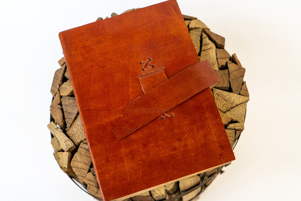 The Artisan's Leather Journal with a Stitch Strap Closure